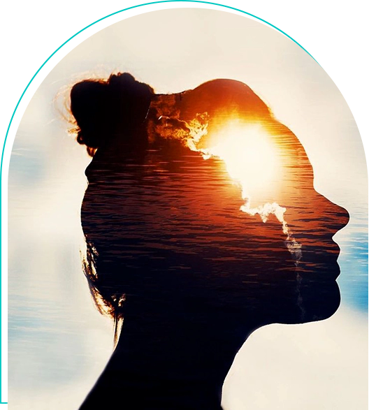 A woman 's head with the sun shining through.